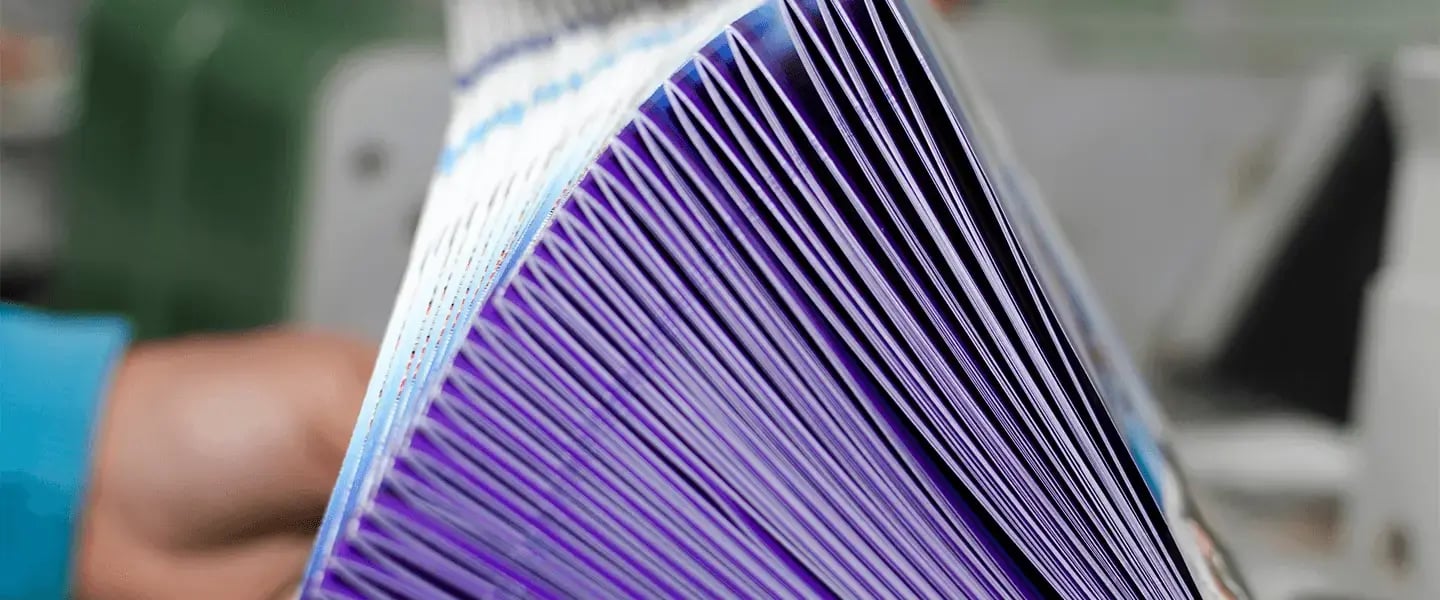 A stack of printed brochuresv